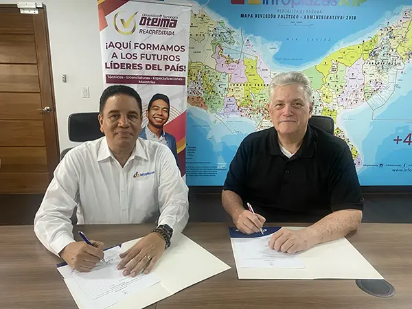 Firma entre entre el Licdo. Ignacio Nelson subdirector de operaciones de INFOPLAZAS AIP Ty el rey. Manning representante en Panamá de la Universidad Tecnológica OTEIMA